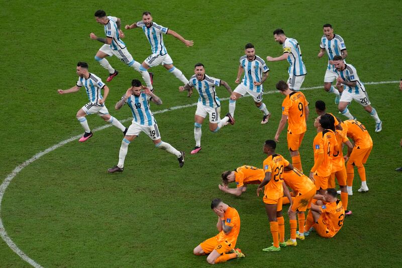 Argentina players celebrate at the end of the match. AP