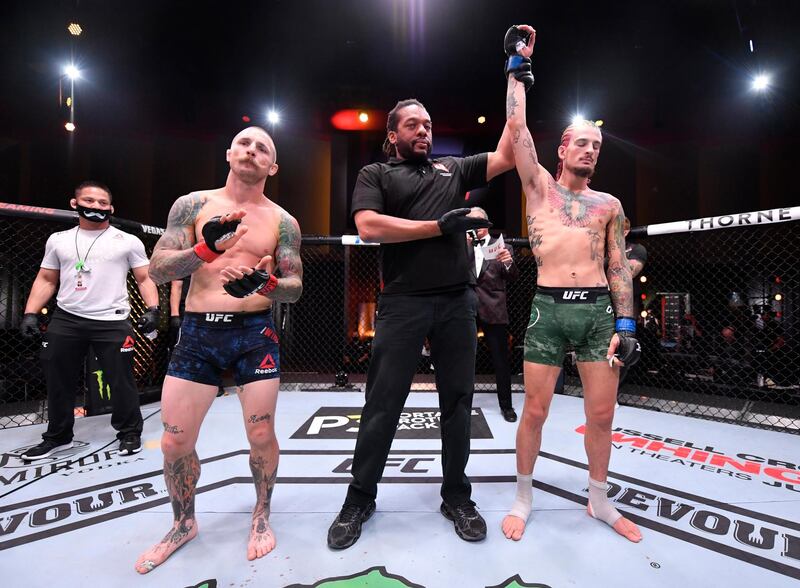 Sean O'Malley celebrates after his knockout victory over Eddie Wineland in their bantamweight bout during UFC 250. Reuters