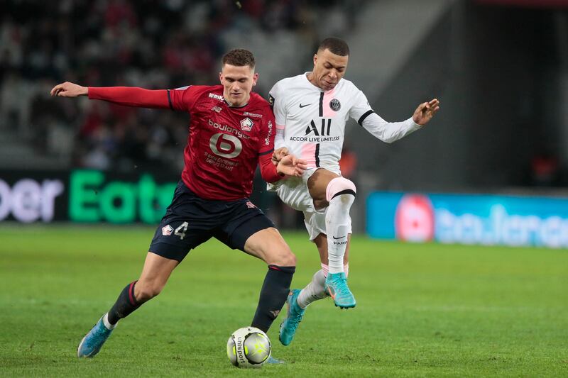 Sven Botman challenges Kylian Mbappe during the Ligue 1 match between Lille and Paris Saint Germain. AP