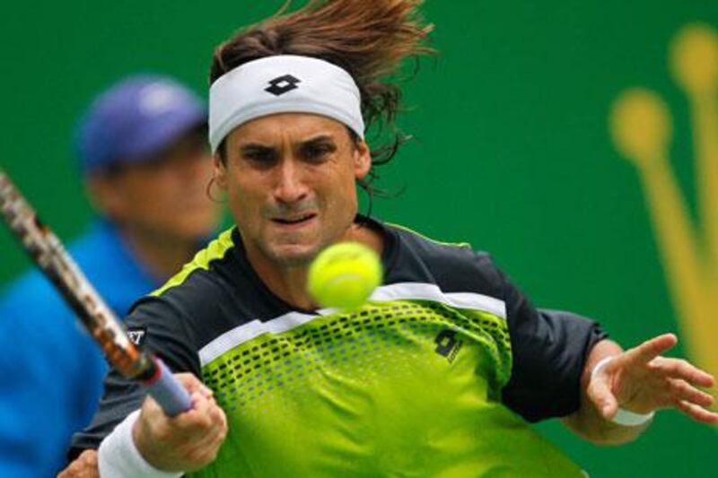 David Ferrer stumbled a bit at first but recovered to send Andy Roddick packing at the Shanghai Masters.