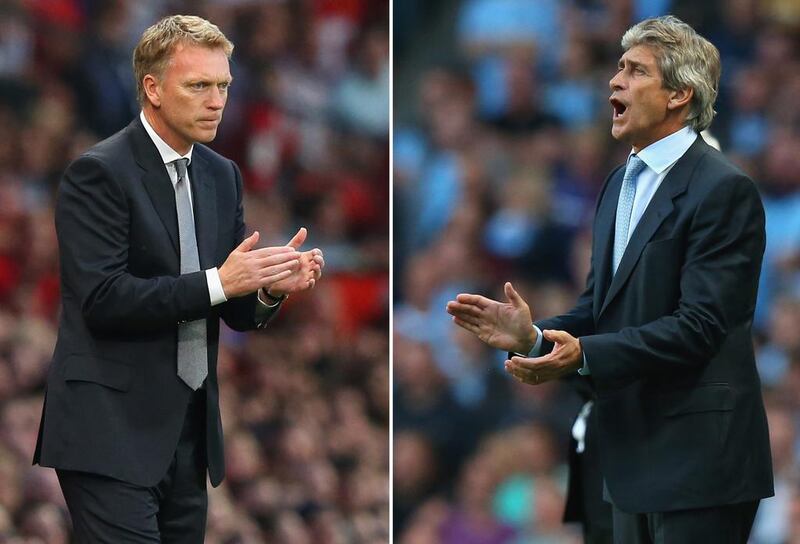 Manchester United manager David Moyes, left, and Manchester City manager Manuel Pellegrini square off for the first time in the latest installment of the Manchester derby on Sunday. Alex Livesey / Getty Images