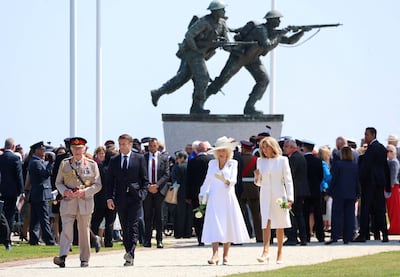 Britain's King Charles III, President of France, Emmanuel Macron, Queen Camilla and Brigitte Macron attend the UK Ministry of Defence and the Royal British Legion's commemorative event at the British Normandy Memorial to mark the 80th anniversary of D-Day in Ver-Sur-Mer, France, on June 6, 2024. Reuters