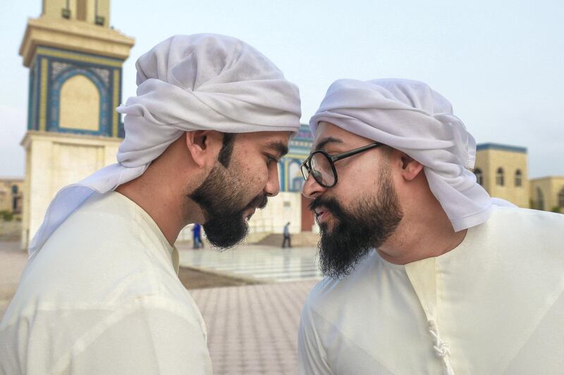 Abu Dhabi, U.A.E., August 21 , 2018.  Early morning prayers at the Masjid Bani Hashim mosque.  Cousins and best friends, (L-R) Nuhman Ghasi and Ahmad Ghasi after the prayers.
Victor Besa / The National
Section:  NA
Reporter:  Haneen Dajani
