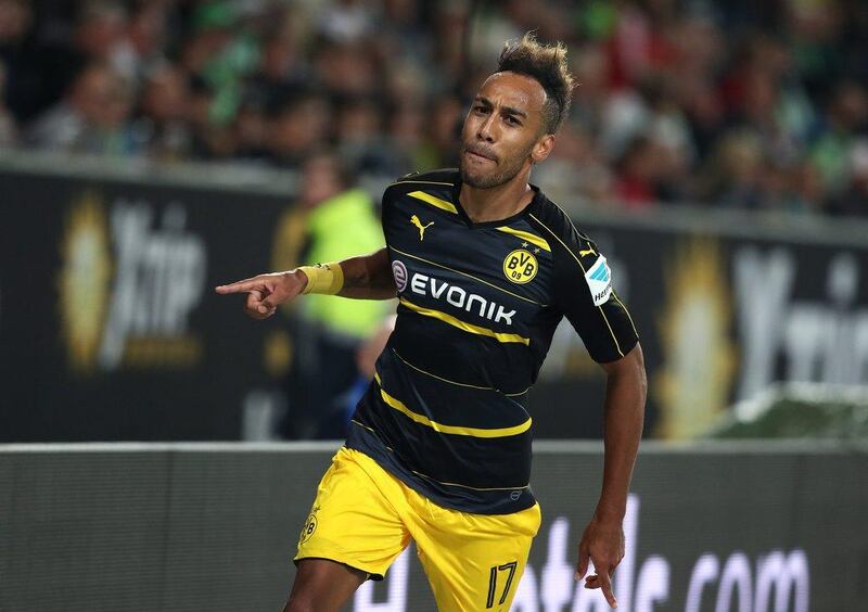 Pierre-Emerick Aubameyang of Dortmund celebrates after scoring his team's second goal against Wolfsburg on Tuesday night. Ronny Hartmann / Getty Images / MAN 