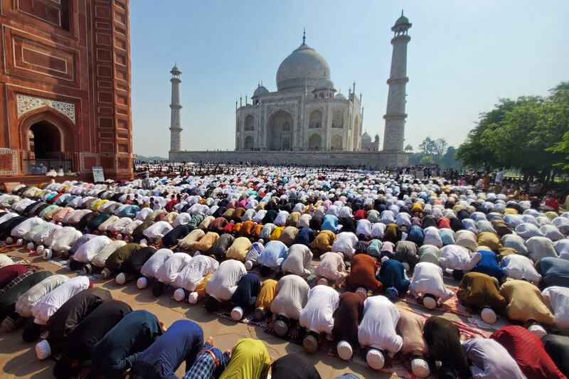 Muslims offer Eid Al Fitr prayers inside the Taj Mahal in Agra, India. AFP