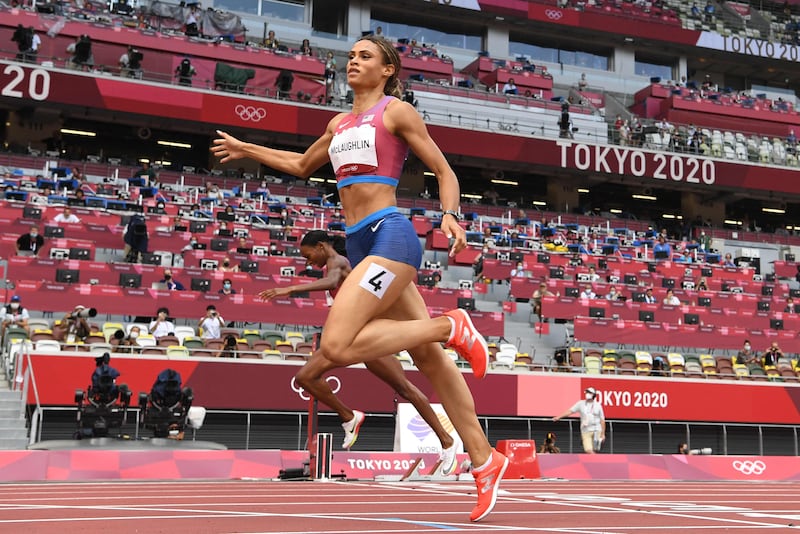 USA's Sydney Mclaughlin crosses the finish line to win the women's 400m hurdles final setting a new world record.