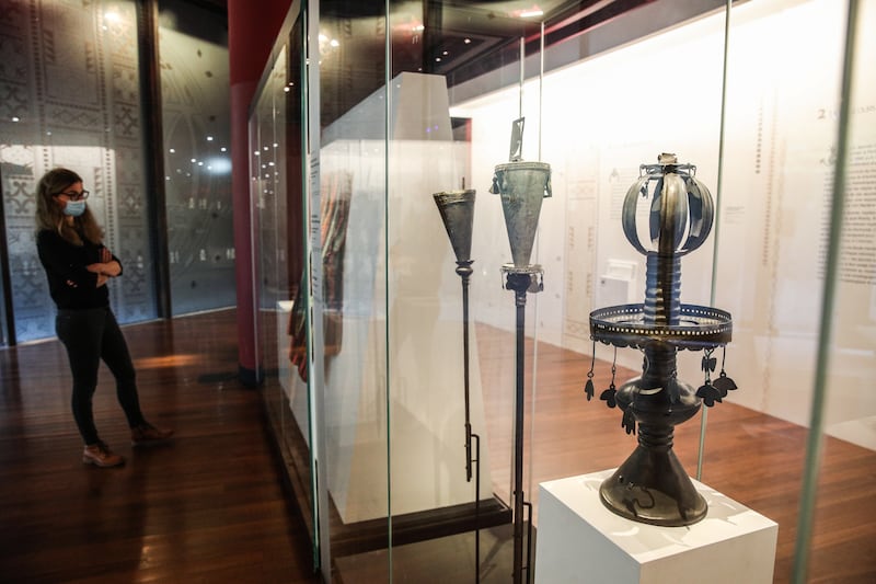 Artworks from the collection on display inside the Quai Branly Museum. The 26 pieces, from a trove of objects taken by French forces in 1892, are being shown for only six days at the museum before being shipped to Benin. EPA