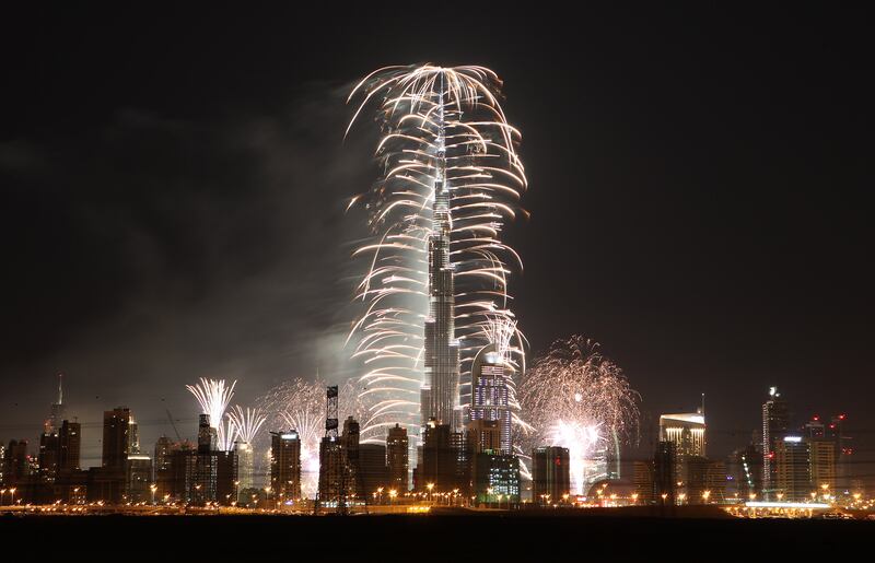 
DUBAI , UNITED ARAB EMIRATES Ð Dec 31 , 2013 : Fireworks display on Burj Khalifa for the new year celebration at Downtown Dubai in Dubai. ( Pawan Singh / The National ) For News
