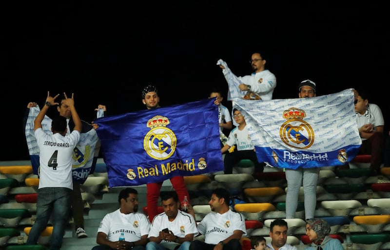 Soccer Football - Club World Cup - Semi-Final - Kashima Antlers v Real Madrid - Zayed Sports City Stadium, Abu Dhabi, United Arab Emirates - December 19, 2018  Real Madrid fans display banners before the match  REUTERS/Andrew Boyers