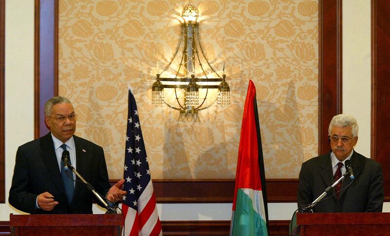 Powell, as US secretary of state, holds a joint press conference with Palestinian prime minister Mahmoud Abbas in May 2003 after their meeting in Jericho. Getty Images