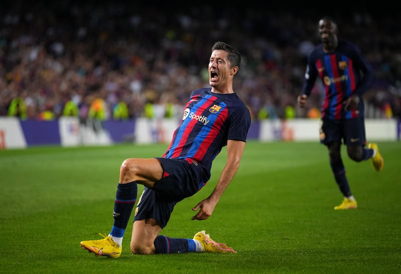 BARCELONA, SPAIN - SEPTEMBER 07: Robert Lewandowski of FC Barcelona celebrates after scoring their team's fourth goal and their hat-trick during the UEFA Champions League group C match between FC Barcelona and Viktoria Plzen at Spotify Camp Nou on September 07, 2022 in Barcelona, Spain. (Photo by Alex Caparros / Getty Images)