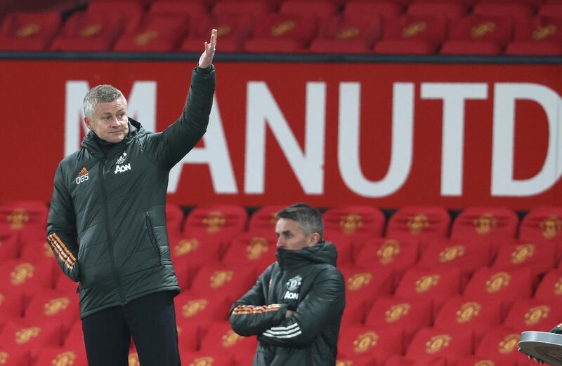 Manchester United's manager Ole Gunnar Solskjaer gives instructions from the side line during the English Premier League soccer match between Manchester United and Brighton and Hove Albion at Old Trafford, Manchester, England, Sunday, Apr. 4, 2021. (Clive Brunskill/Pool via AP)
