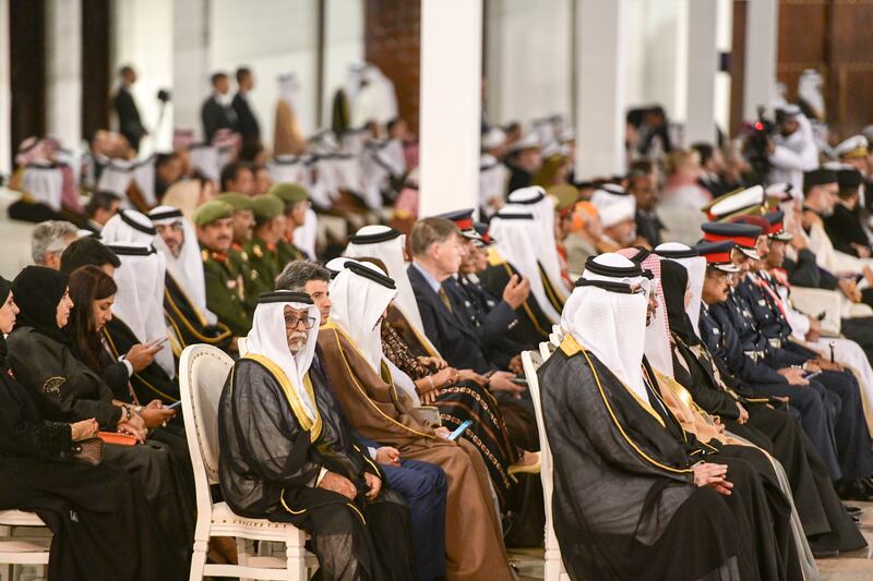 The audience waits for the arrival of Pope Francis at Sakhir Palace. Khushnum Bhandari / The National
