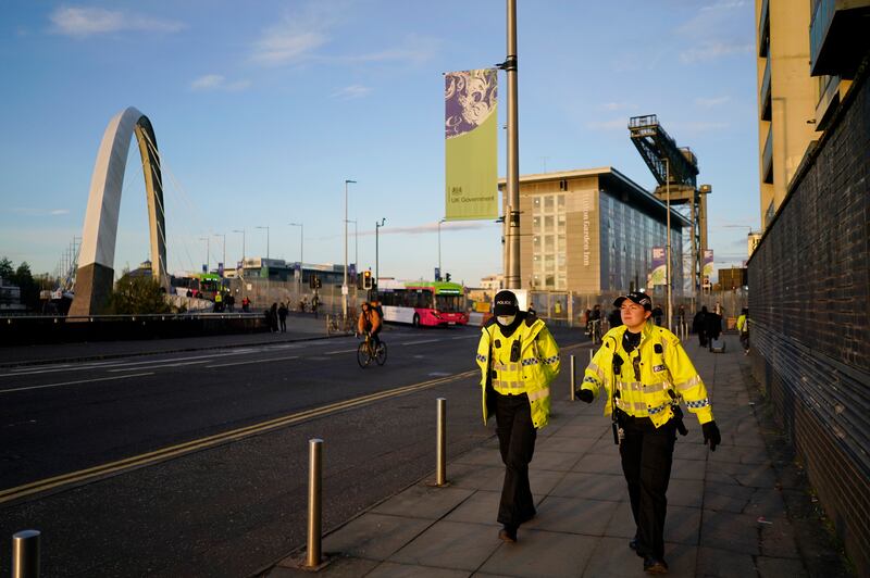 Police patrol outside the summit's venue. AP Photo