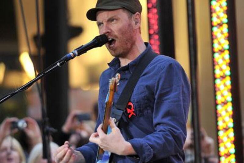 Jonny Buckland of Coldplay. Stephen Lovekin / Getty Images / AFP