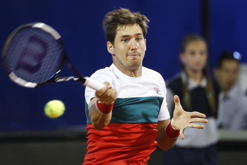 Dusan Lajovic of Serbia returns the ball to Dominic Thiem in Belgrade. Getty