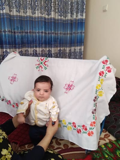 Sohail Ahmadi, about two-months-old, went missing at Kabul airport. Ahmadi family via Reuters