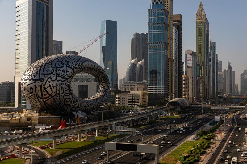 The Museum of The Future stands on the city skyline among commercial and residential properties in Dubai, United Arab Emirates, on Tuesday, Oct. 13, 2020. Dubai real estate stocks were once the stars for investors betting on the city’s booming economy. But their fall from grace has been spectacular and seems set to continue, given an abundance of unsold homes and scant prospects for a recovery in the oil-rich region. Photographer: Christopher Pike/Bloomberg