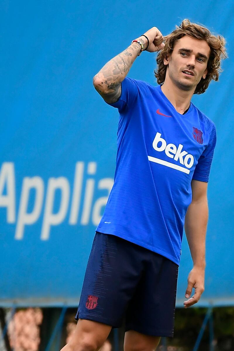 Barcelona's French forward Antoine Griezmann gestures during a pre-season training session at the Joan Gamper training ground. AFP