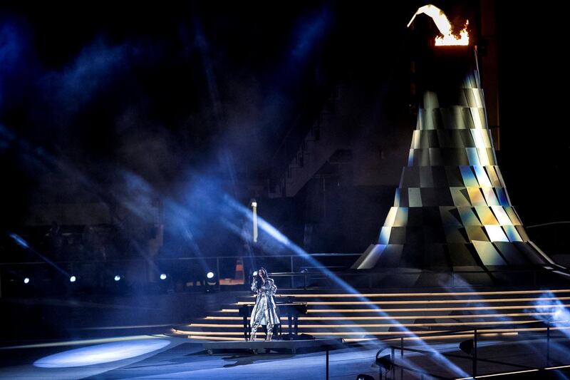 The flame flickers during the closing ceremony. Reem Mohammed / The National