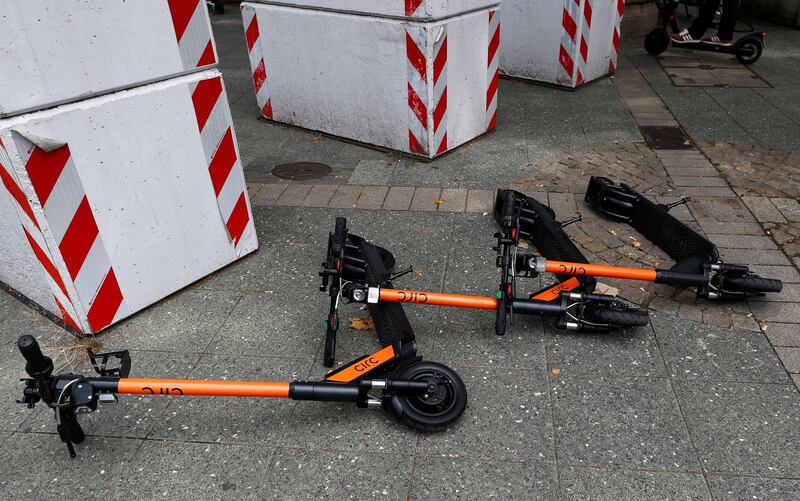 Circ e-scooters lay on the ground at the entrance to a pedestrian area in Frankfurt, Germany, August 8, 2019.   REUTERS/Kai Pfaffenbach