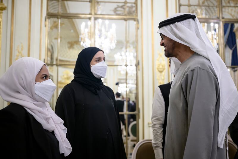 Sheikh Mohamed greets students and doctors. 