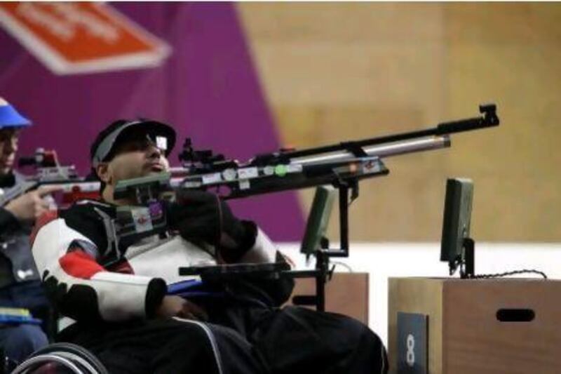 Abdullah Sultan Al Aryani hits his target, a gold medal in the mixed R6-50m air rifle prone SH1 final round on Tuesday in the London Paralympics.