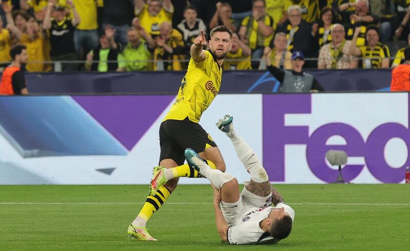 Niclas Fullkrug starts to celebrate after scoring to give Borussia Dortmund the lead against Paris Saint-Germain during the Champions League semi-final first leg match. EPA