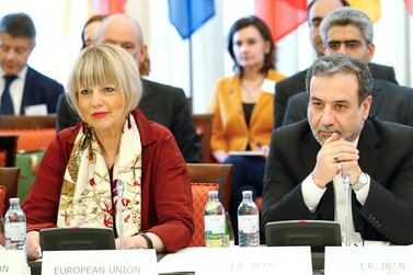 Iran's top nuclear negotiator Abbas Araqchi and Secretary General of the European External Action Service Helga Schmit attend a meeting of the JCPOA Joint Commission in Vienna, Austria. Reuters