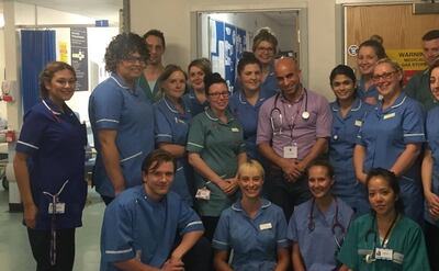 Ahmed Hankir poses for a group photo while he was working as a doctor in Emergency Medicine in Leeds Hospitals in 2016. Photo: Ahmed Hankir