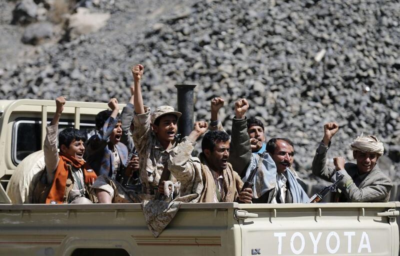 Houthi rebels ride a truck through Sanaa on February 15, 2015. Khaled Abdullah/Reuters