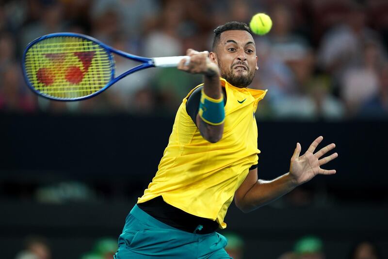 epa08099642 Nick Kyrgios of Australia returns during his singles match against Jan-Lennard Struff of Germany on day 1 of the ATP Cup tennis tournament
in Brisbane, at Pat Rafter Arena, Brisbane, Australia, 03 January 2020.  EPA/DAVE HUNT AUSTRALIA AND NEW ZEALAND OUT  EDITORIAL USE ONLY