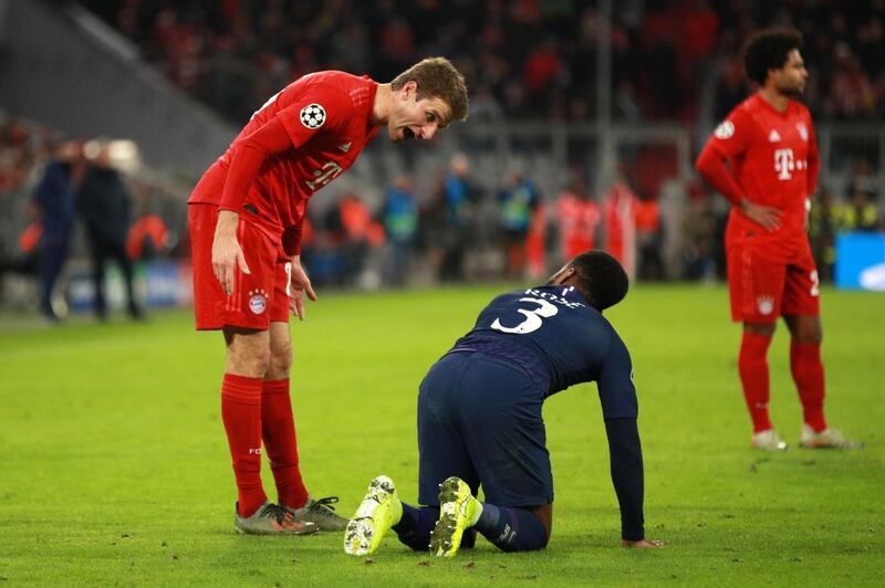 Thomas Muller argues with Danny Rose. Getty Images