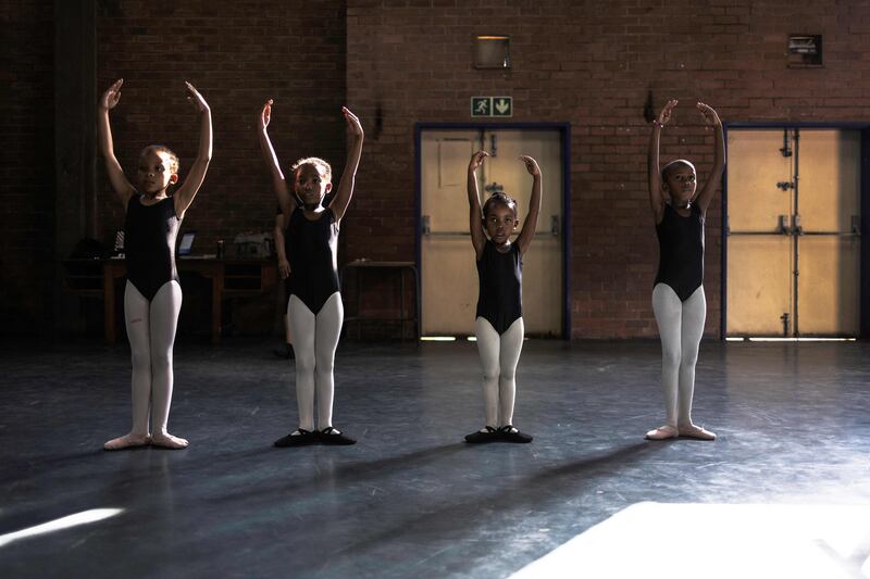 Ballet students show off their skills in Alexandra, near Johannesburg. AFP