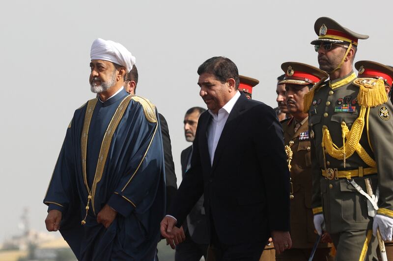 Iran's First Vice President Mohammad Mokhber welcomes Oman's Sultan Haitham bin Tariq upon his arrival at Mehrabad Airport in Tehran, Iran. Reuters