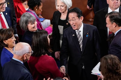 Japanese Prime Minister Fumio Kishida greets Congress members after his address at the US Capitol. AFP