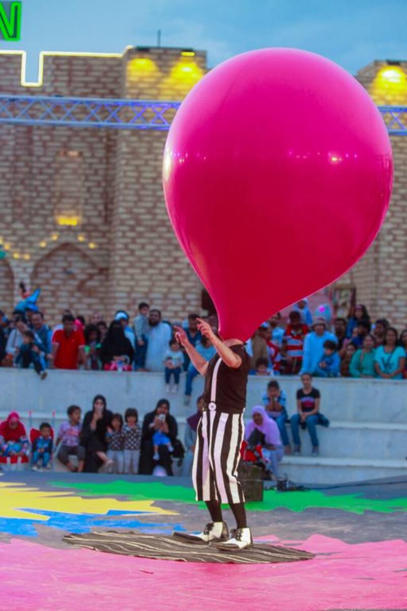 Otto Bas Sotto from Italy performs a trick with his giant red balloon. Victor Besa for The National