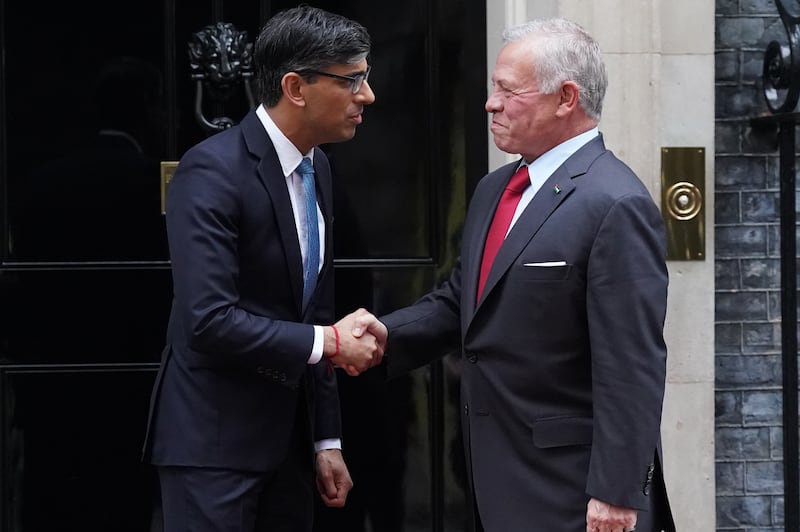 Mr Sunak and King Abdullah at the door to 10 Downing Street. PA
