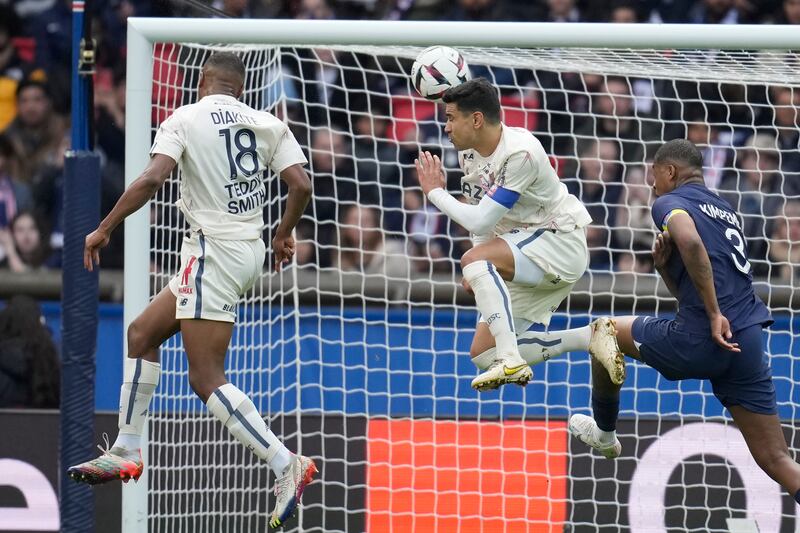 Lille's Bafode Diakite, left, pulls a goal back. AP