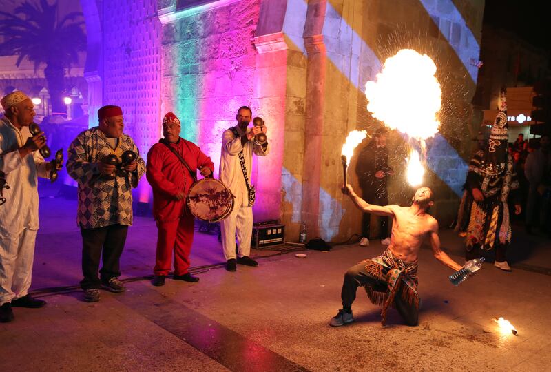 A firebreather of the Soufi Stambali group at the second Lighten Medina festival in Tunis, Tunisia. EPA
