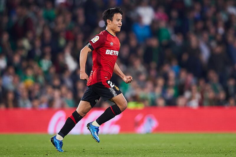 SEVILLE, SPAIN - FEBRUARY 21: Takefusa Kubo of RCD Mallorca celebrates scoring his team's third goal during the Liga match between Real Betis Balompie and RCD Mallorca at Estadio Benito Villamarin on February 21, 2020 in Seville, Spain. (Photo by Fran Santiago/Getty Images)