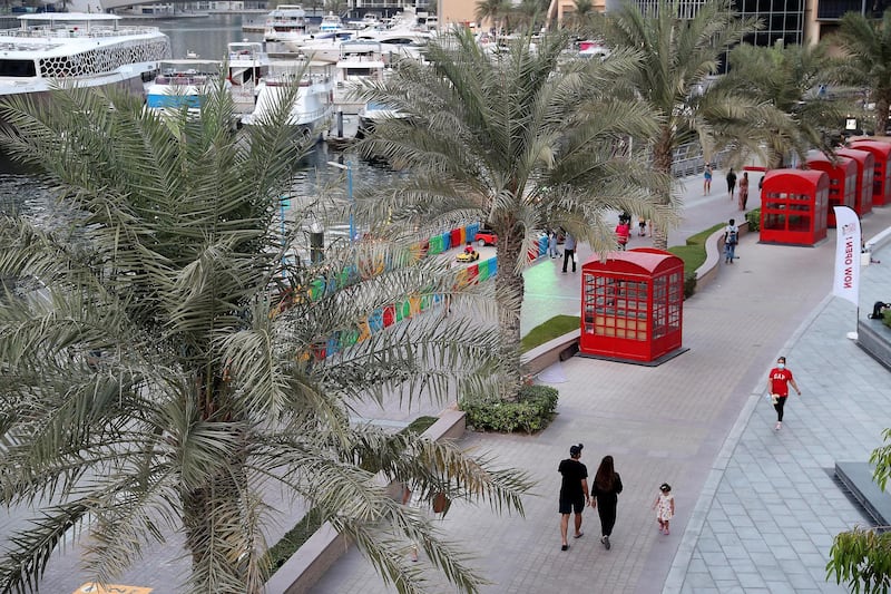 DUBAI, UNITED ARAB EMIRATES , October 12 – 2020 :- View of the marina walk in Dubai Marina in Dubai. (Pawan Singh / The National) For Stock