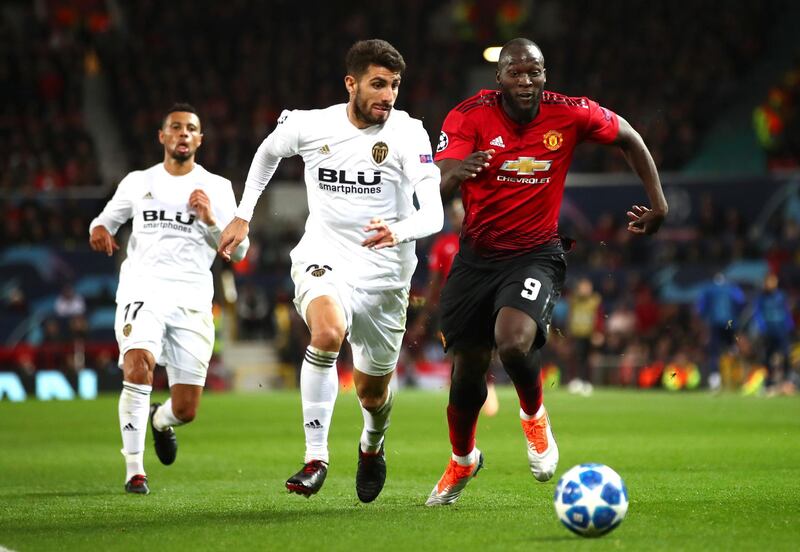 Manchester United' Romelu Lukaku battles for possession with Valencia's Cristiano Piccini. Getty Images