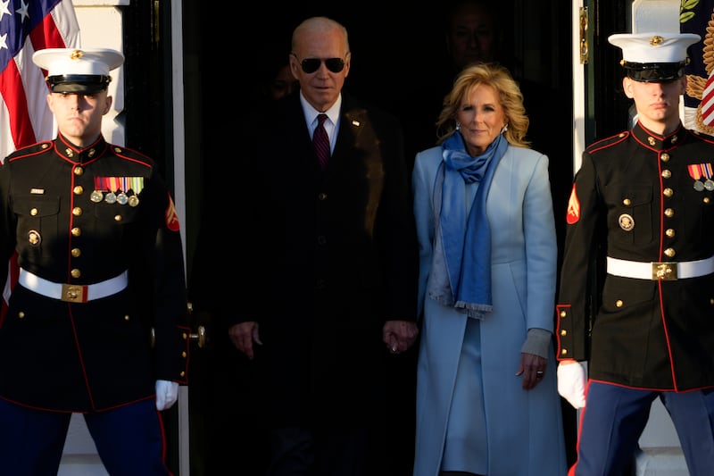 Mr Biden and first lady Jill Biden arrive for the ceremony. AP