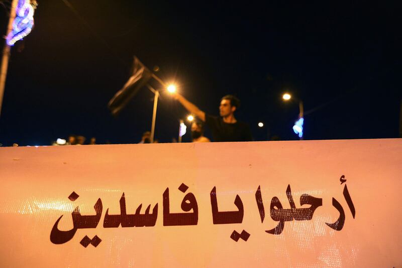 Iraqi graduates from the Dhi Qar governorate demonstrate in its major city of Nasiriyah on August 23 to demand the removal of officials they accuse of corruption.  AFP