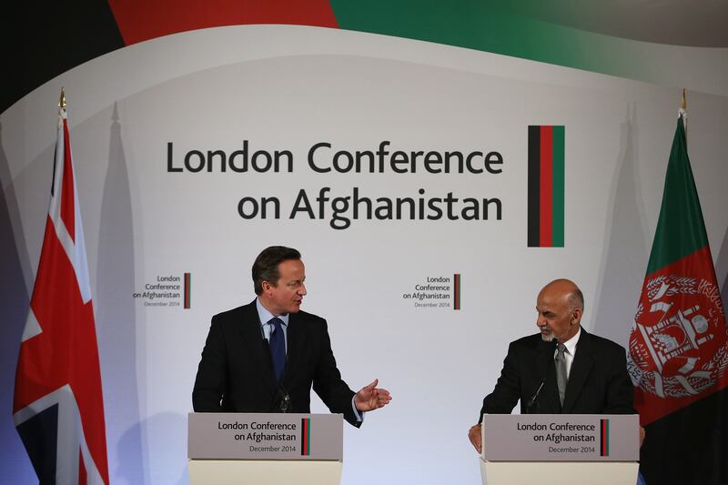 Afghanistan's President Ashraf Ghani and Mr Cameron speak to the media during the London Conference on Afghanistan in December 2014