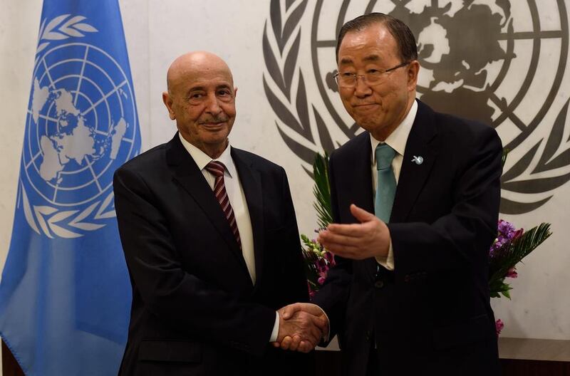 Ageila Saleh, Libya's acting head of state, and UN secretary general Ban Ki-moon (R) meet during the 70th session of the United Nations General Assembly in New York on September 29, 2015. Don Emmert/AFP Photo

