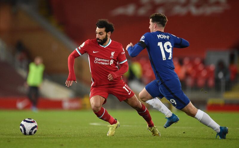 Liverpool's Mohamed Salah and Chelsea's Mason Mount battle for the bal. PA
