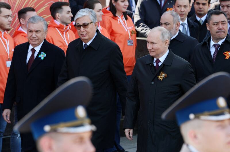 Mr Putin, Kazakh President Kassym-Jomart Tokayev and Uzbek President Shavkat Mirziyoyev attend the parade. Reuters