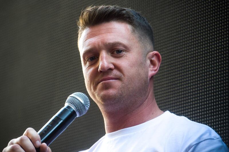 LONDON, ENGLAND - MAY 14:  British far-right activist and pundit, Tommy Robinson (real name Stephen Yaxley-Lennon) speaks to his supporters outside the Old Bailey on May 14, 2019 in London, England. Mr Robinson is appearing over allegations that he committed contempt of court by allegedly filming people involved in a criminal trial and broadcasting footage on social media. (Photo by Peter Summers/Getty Images)